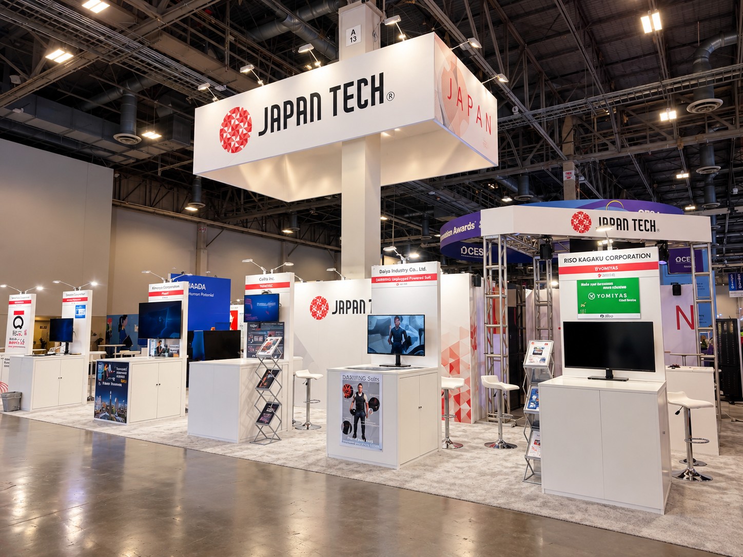 Japan Tech pavilion with the hanging JAPAN TECH sign above white member counters