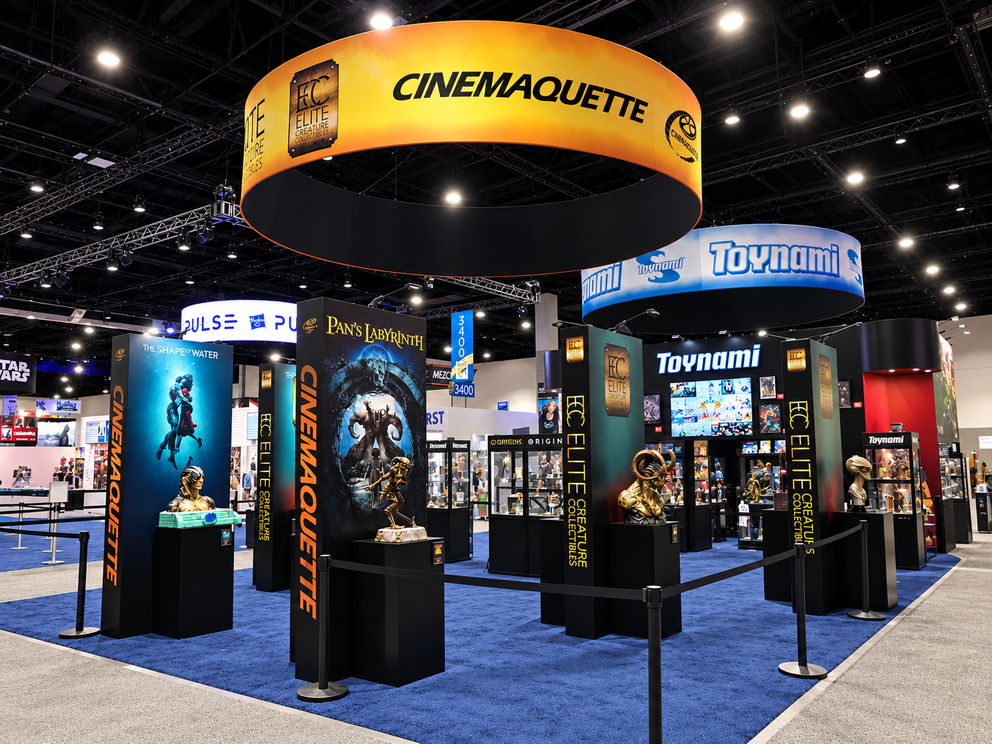 Collectibles booth with glass display cases and overhead brand rings
