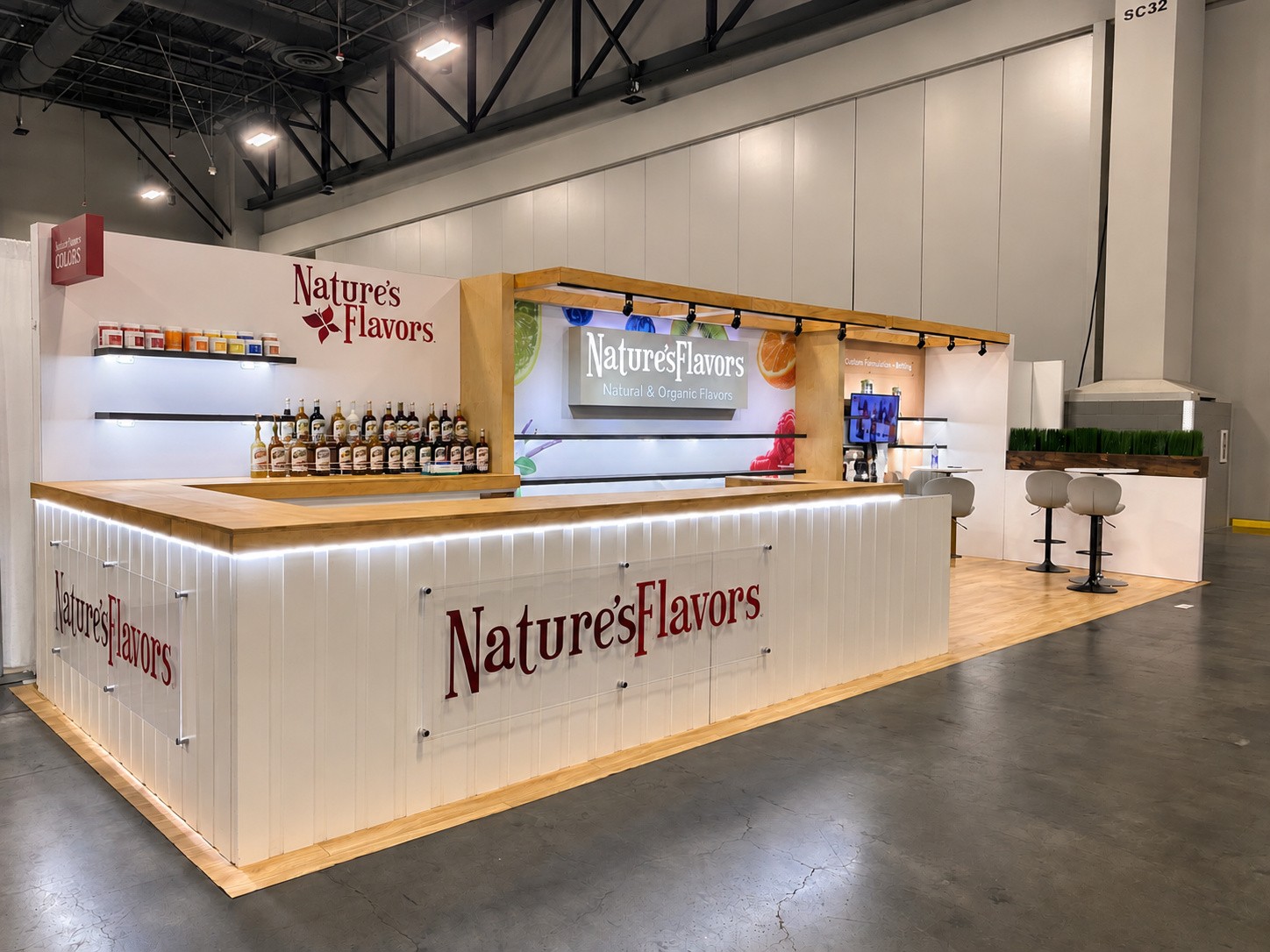 counter face of the Nature's Flavors inline with the wordmark across three acrylic panels